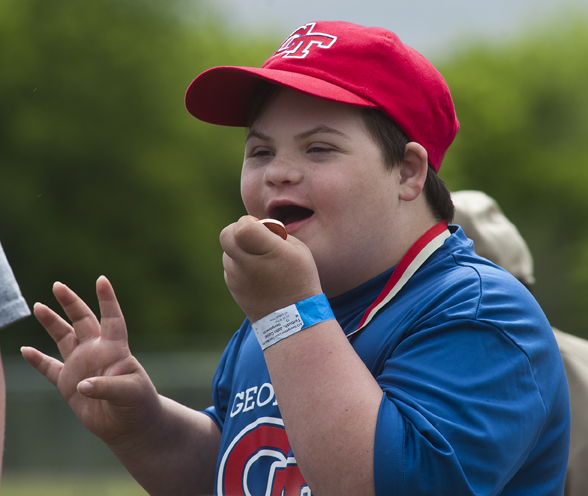 Savoring a well-deserved medal.