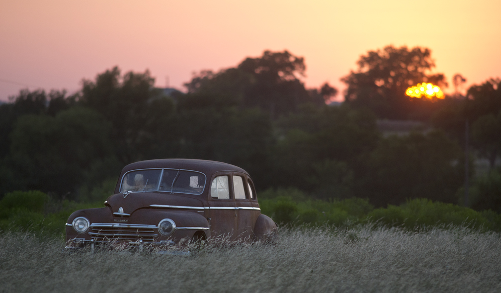Old Car In Field