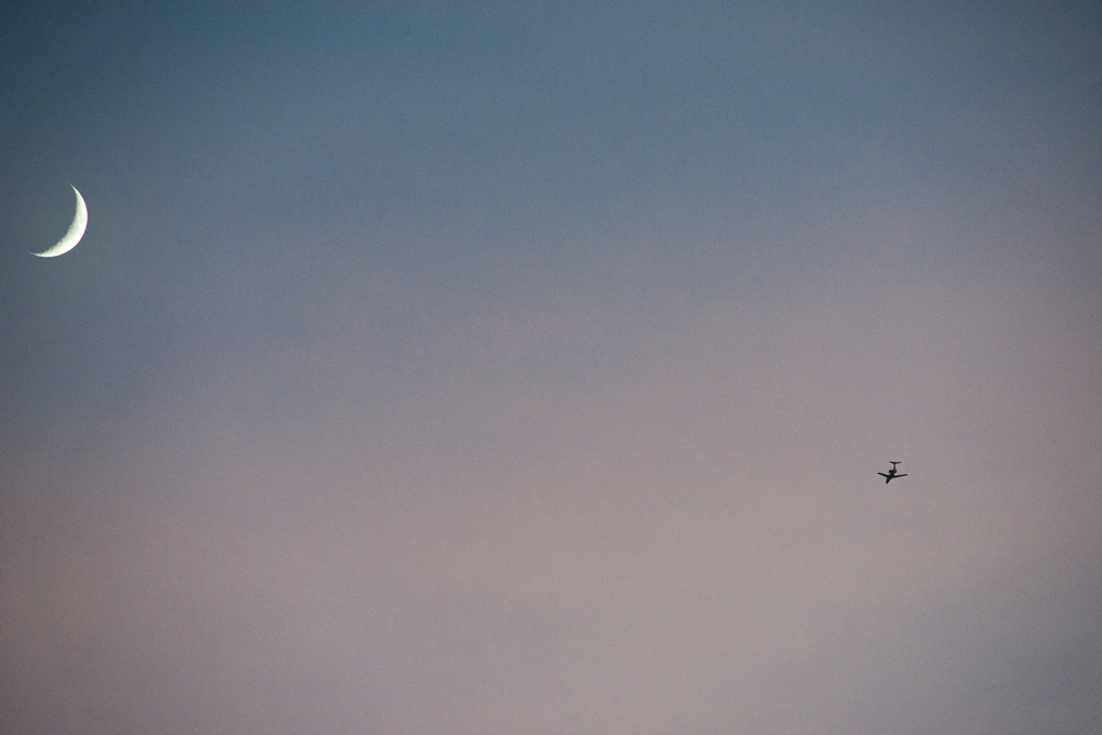 Sharing magenta skies with the moon