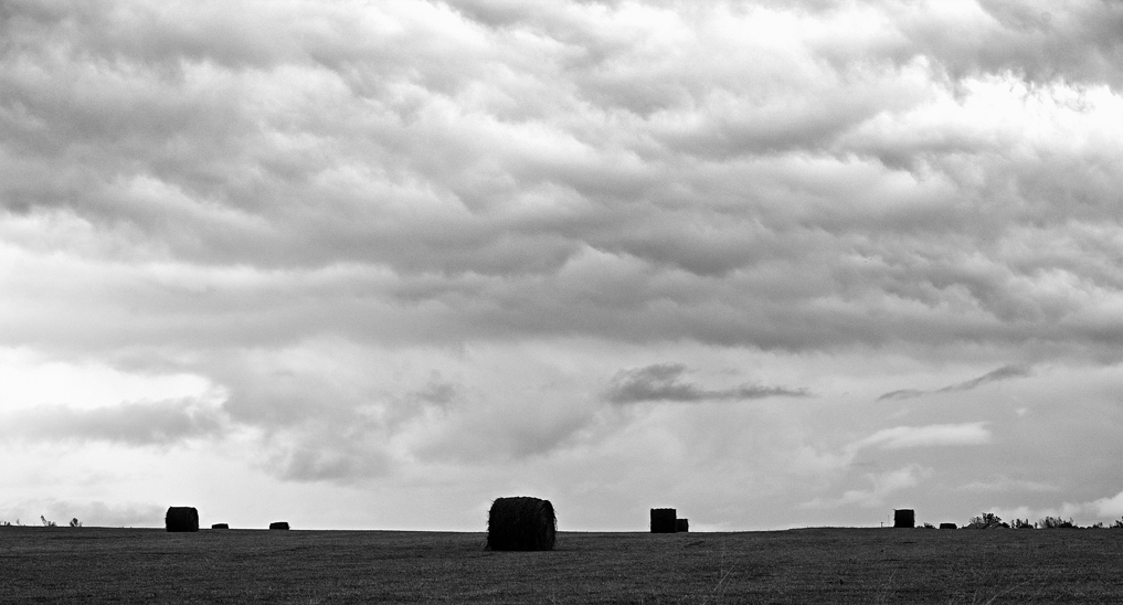 Clouds Above Hay Bales